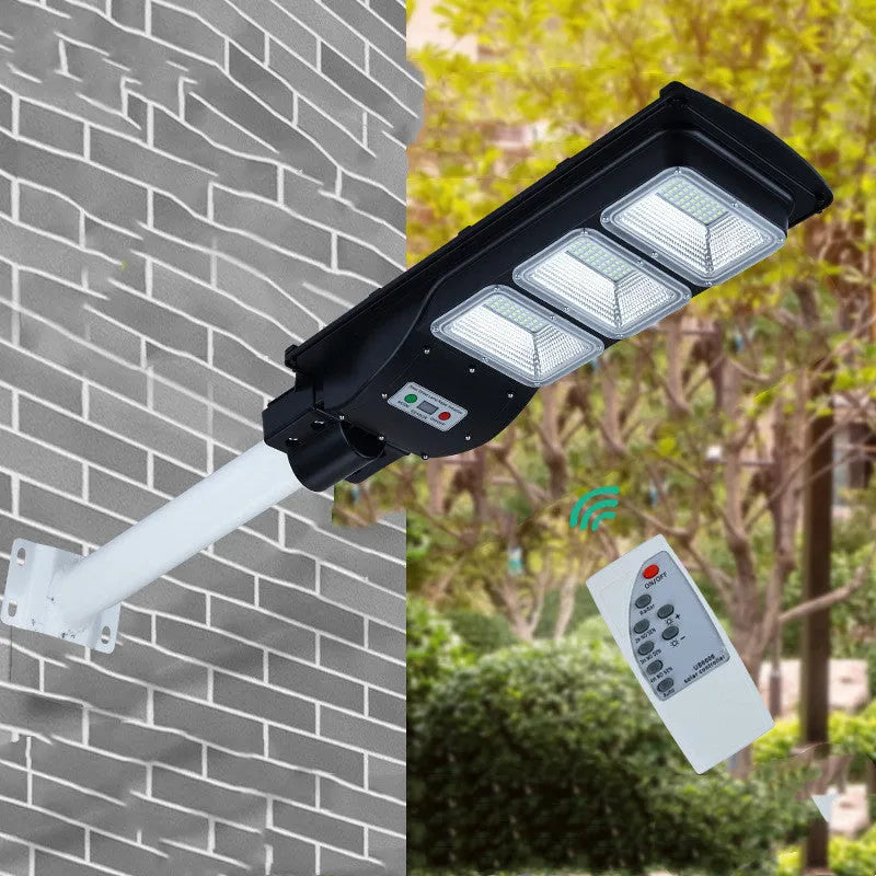 60W integrated solar-powered LED street light unit with remote control for outdoor use.