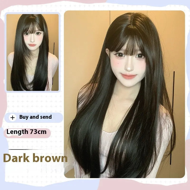 A dark brown long straight synthetic wig with a fringe on a wig stand.