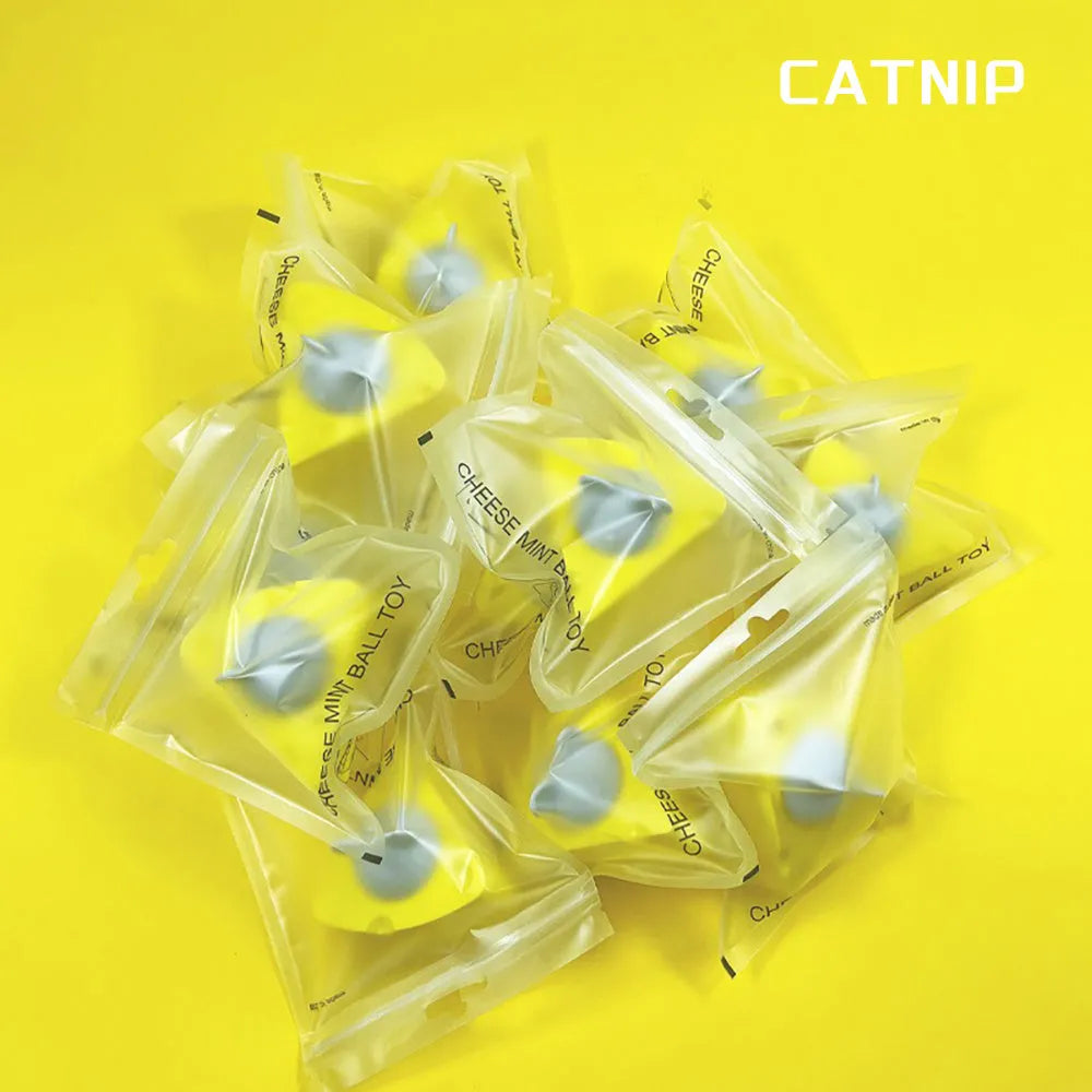 Yellow catnip toy balls with edible cheese flavour for cat teeth cleaning and play
