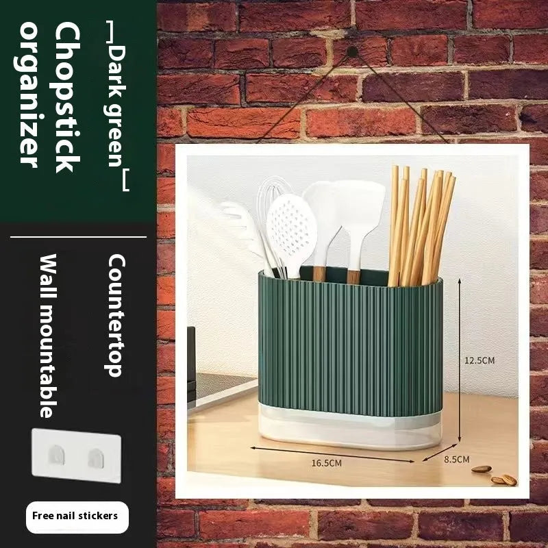 Modern plastic chopsticks tube holder mounted on kitchen wall holding utensils