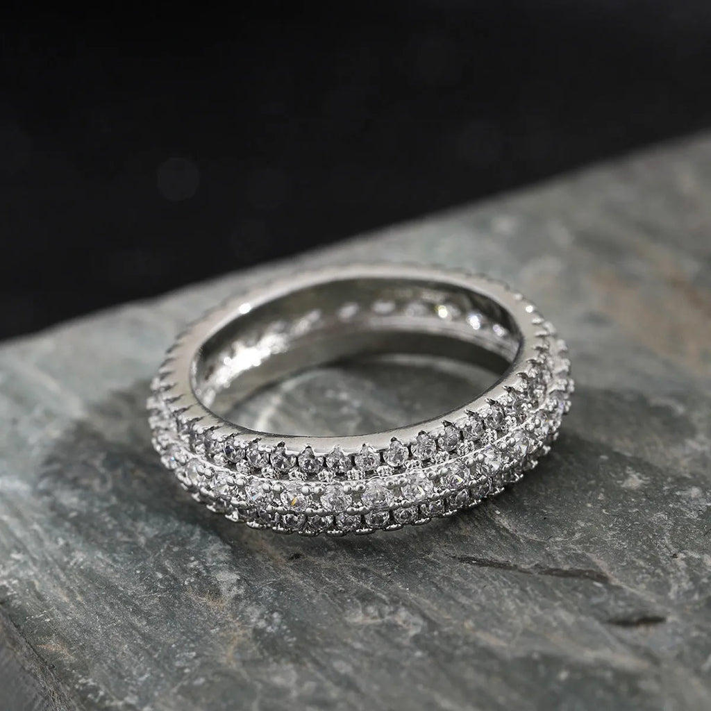 Geometric personalised ring with triangular design and zircon stone, shown in a gold colour finish.