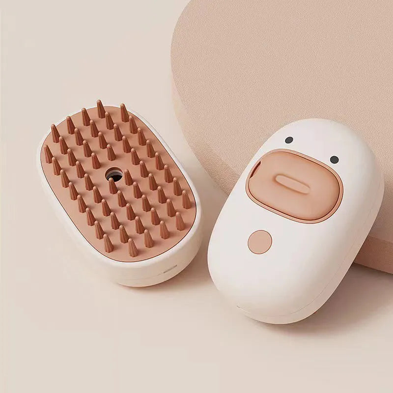 White rechargeable pet steam brush with water tank for cat and dog grooming