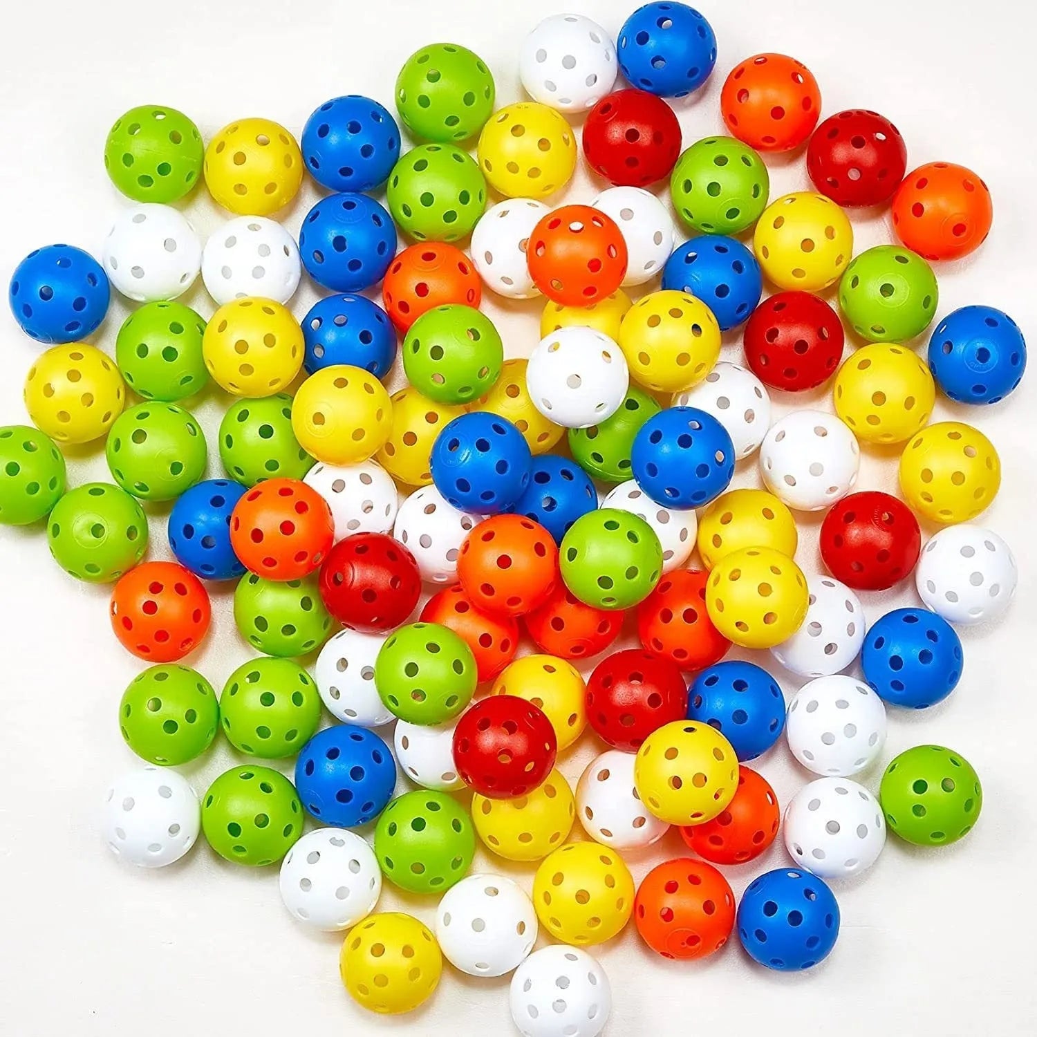 Multi-coloured 42mm golf practice balls with dimpled design in a net bag.