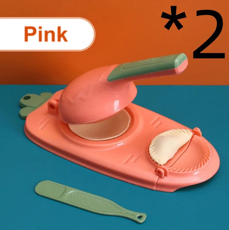 Orange and white manual dumpling skin press tool with ergonomic handle and hanging hole