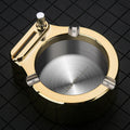 Large blue metal ashtray with integrated sliding stick permanent match lighter and three cigarette slots.