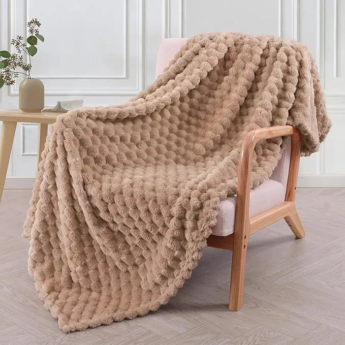 Children's soft plaid polyester blanket shown in camel colour, suitable for nap time.