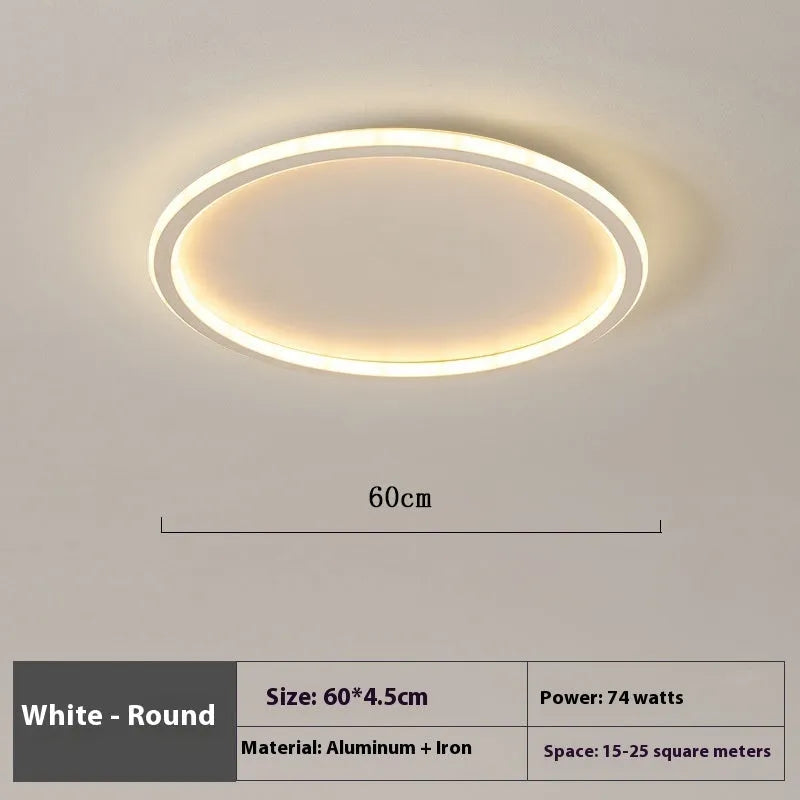 Minimalist circular dimmable LED ceiling lamp in black, gold or white finish.