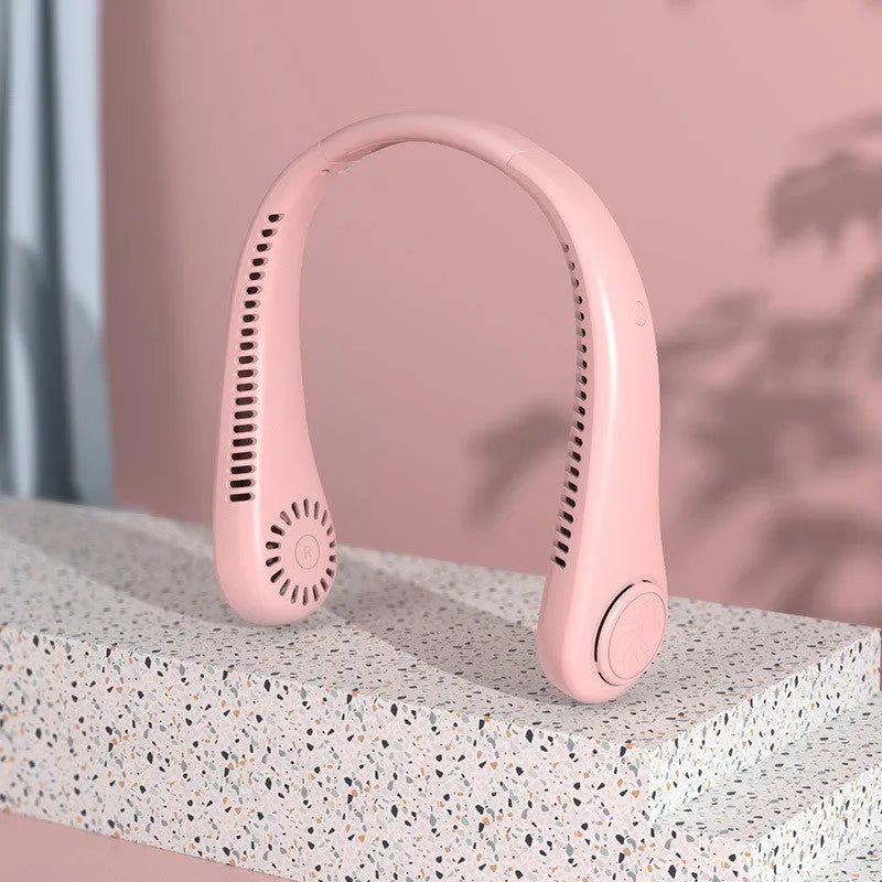 White USB rechargeable bladeless neck fan being worn, showing its compact design and flexible neckband.