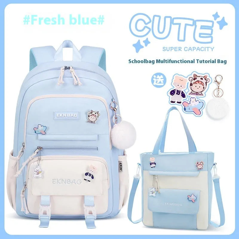 Pink waterproof Oxford cloth school backpack for girls with curved shoulder straps.