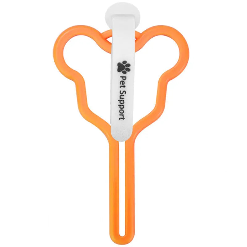 A dog poo bag holder with a hands-free clip and black Velcro strap attached to a leash.