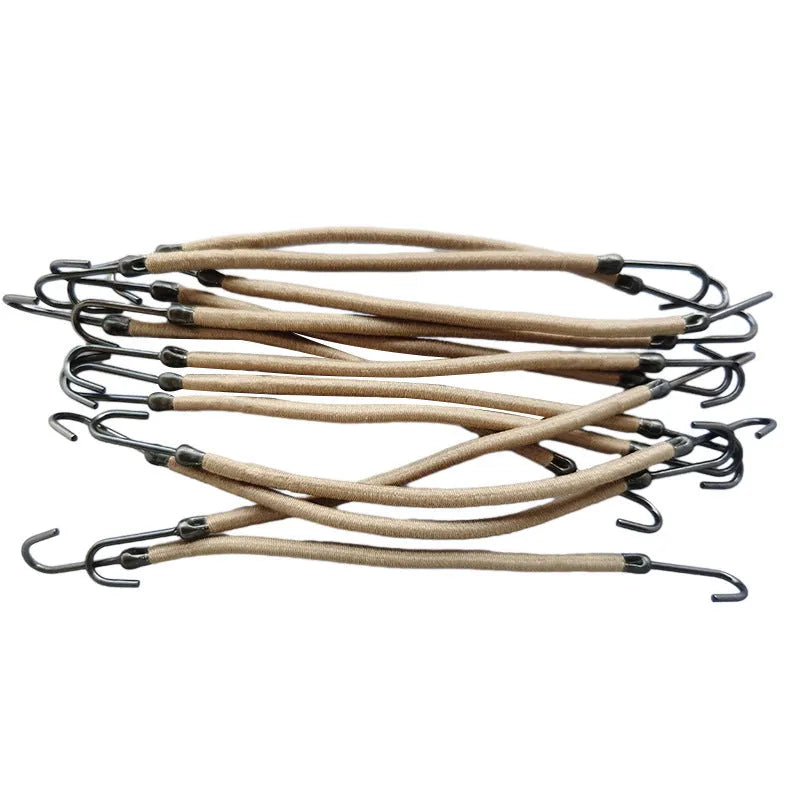 Close-up of a black double hook hair tool for fastening wigs and hair weaves.