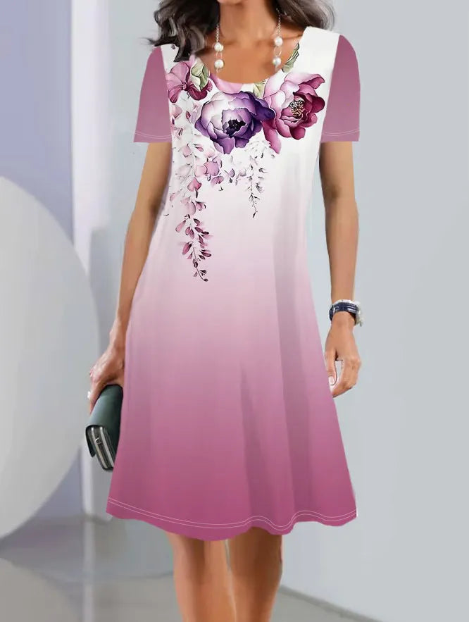 Women's light blue floral print Ice Silk mid-length dress with short sleeves and round neck.
