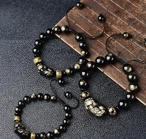 Hand-woven golden obsidian Pi Xiu bracelet with natural stone beads in Chinese zodiac style