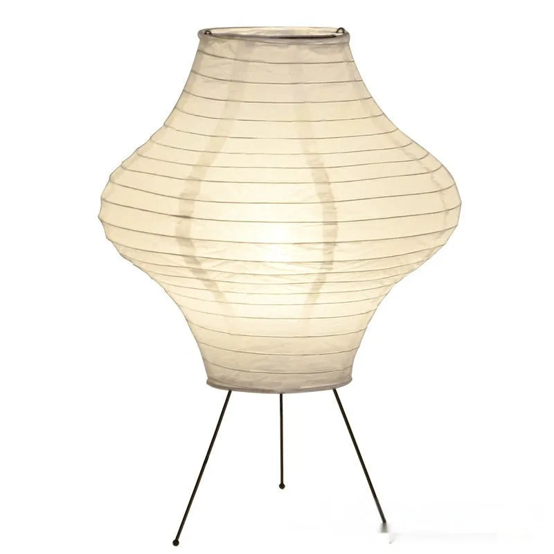 Silent Wind Japanese style Xuan paper table lamp with soft white glow on a wooden table.