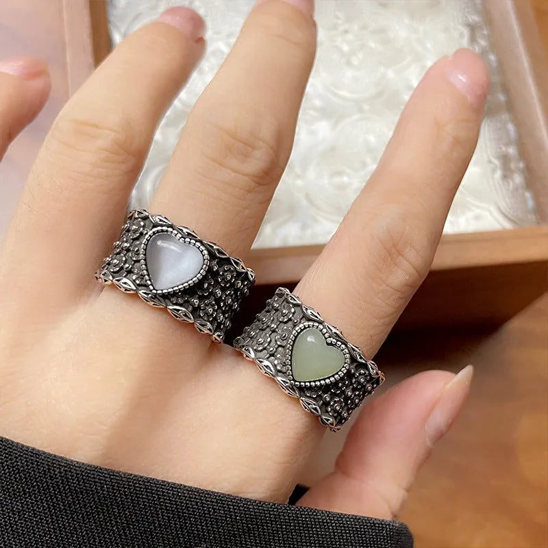 Retro wide-faced adjustable heart ring in white copper plated silver, available in green or white