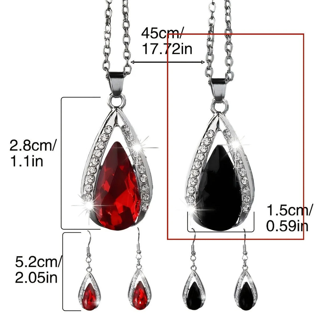 Black and red teardrop glass pendant necklace and matching alloy earrings set on display.