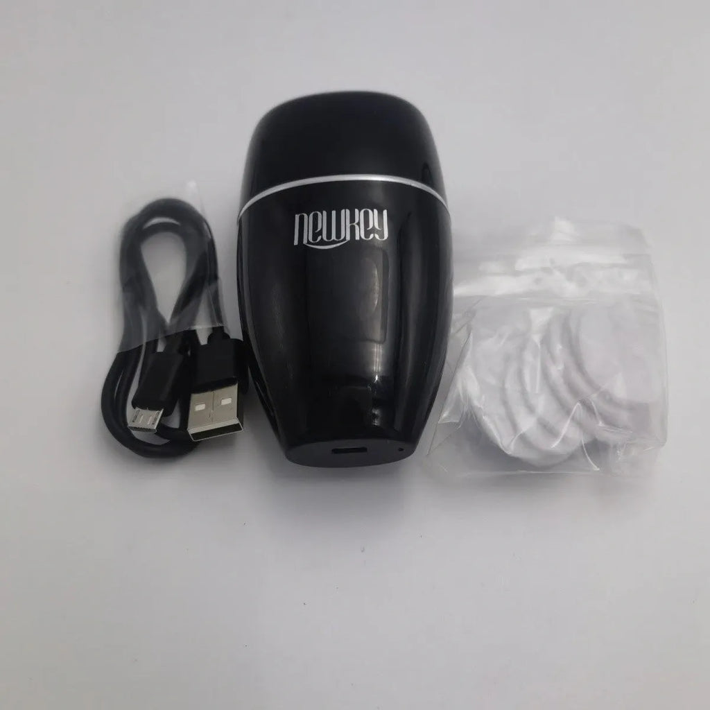 Electric lip plumper device with USB cable in black or white colour options