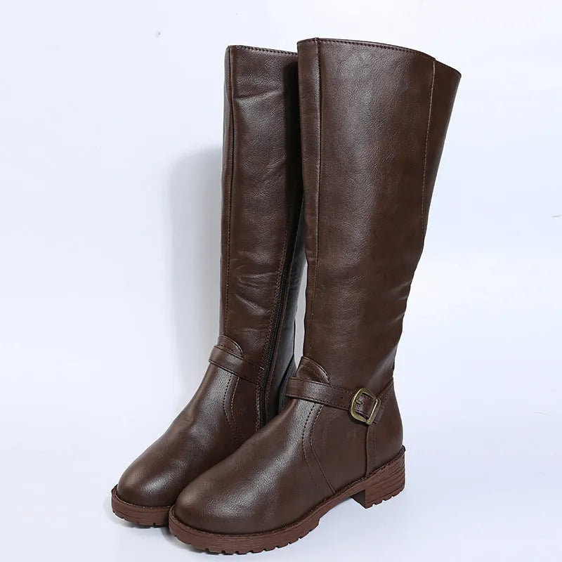 Women's black knight style ankle boots with a buckle detail on the upper and a square heel.