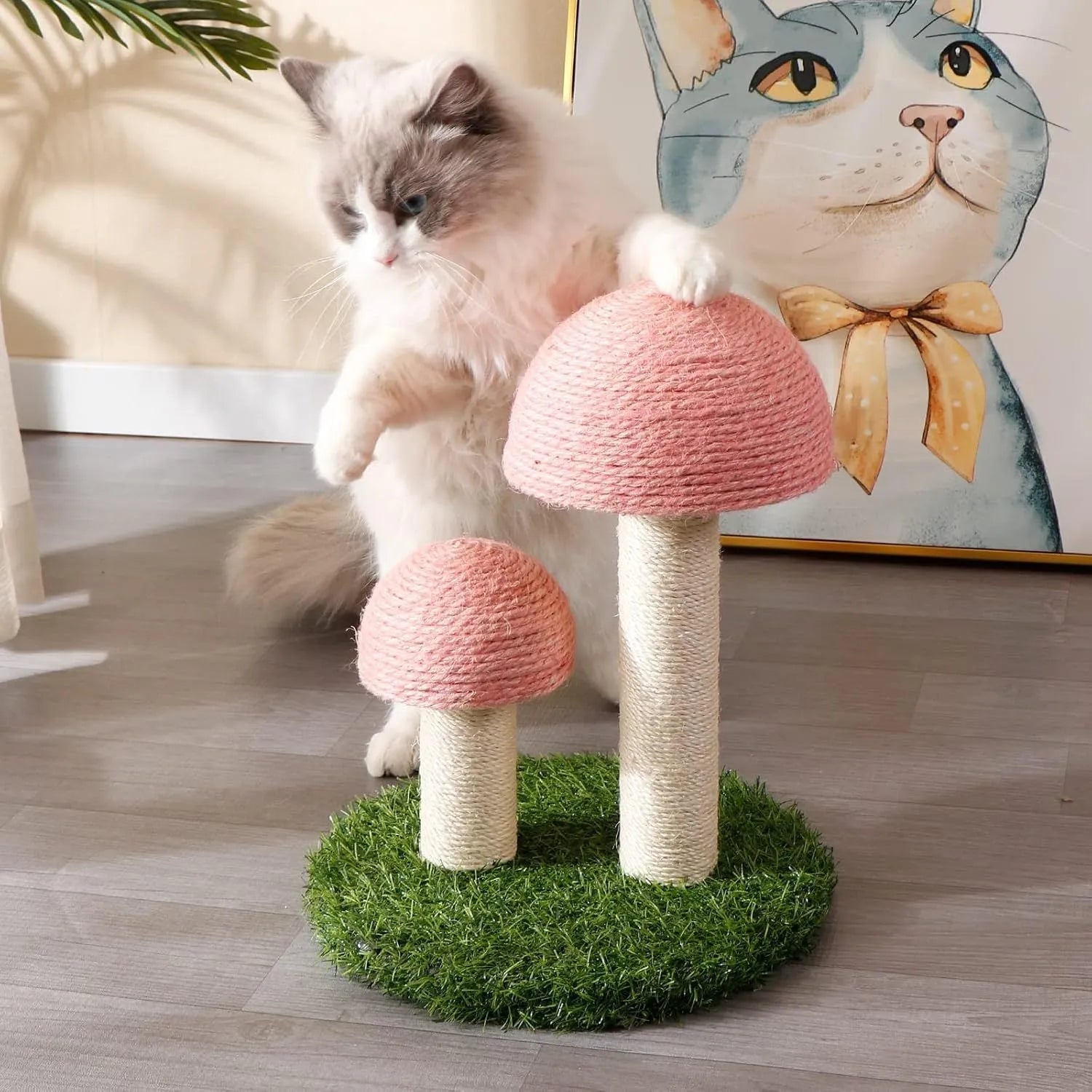 Pink mushroom-shaped cat scratching post with natural sisal caps and pole for kittens and small cats