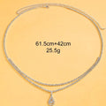 Gold and silver waist chain jewellery with a water drop pendant and adjustable lobster buckle clasp.