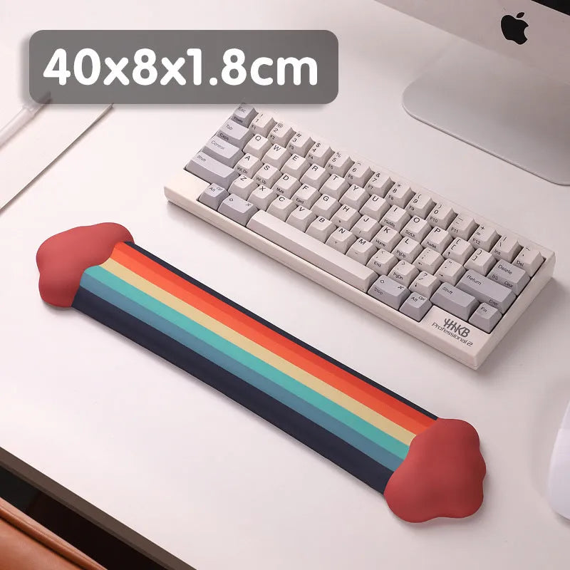 Silicone wrist rest mouse pad and keyboard holder set with cloud pattern on a desk.