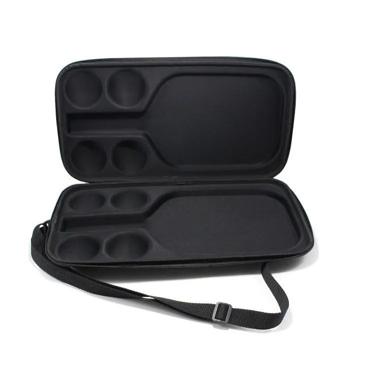 Black EVA pickleball paddle carry case with shoulder straps, showing interior space for one racket and four balls.