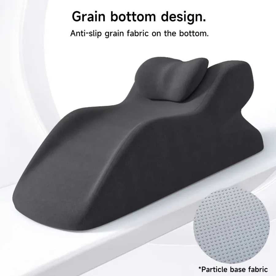 Stomach sleeper pillow designed for reading and phone use while lying down in blue colour option