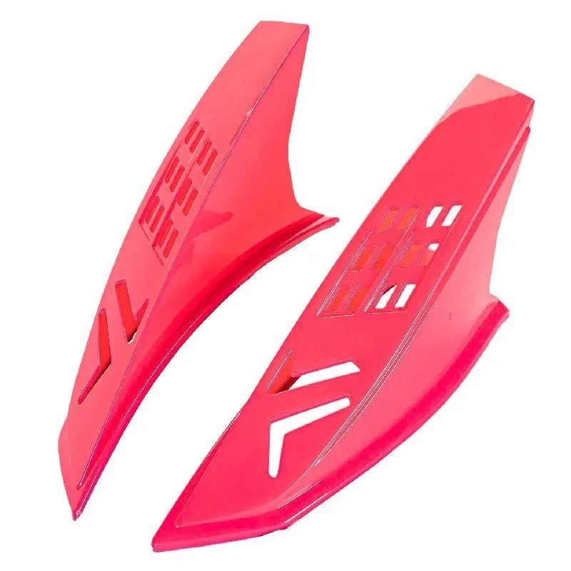 A pair of black plastic decorative horns for children's helmets with visible 3M adhesive backing.