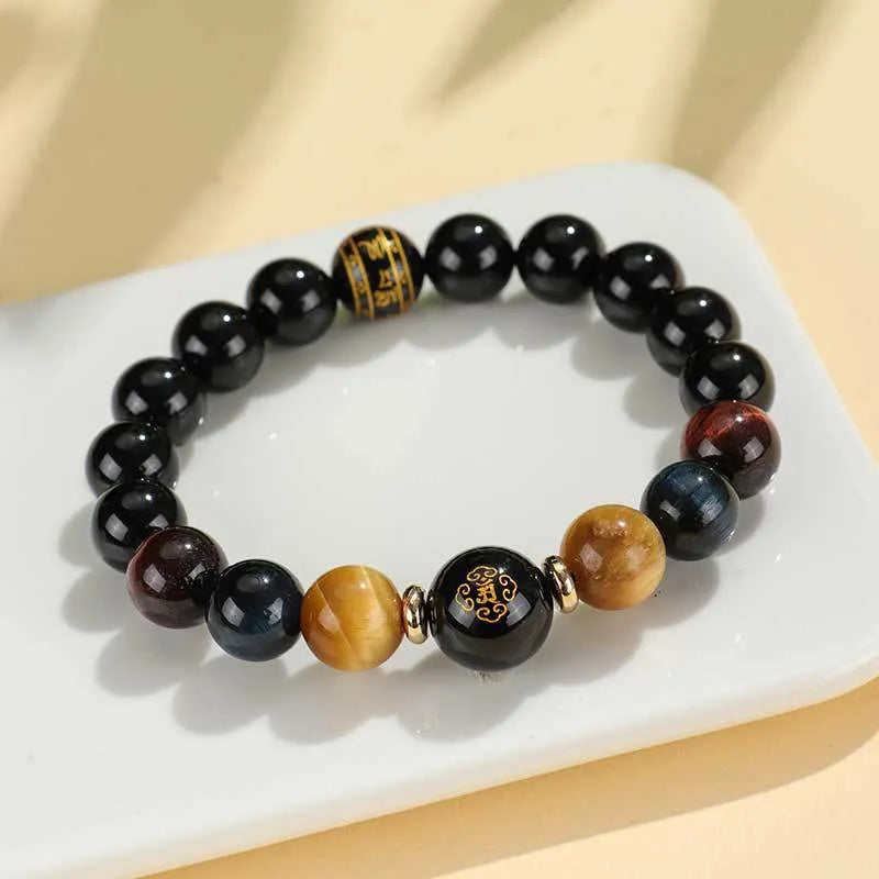 Black agate zodiac animal beaded bracelet with gold, blue and red tiger eye stones