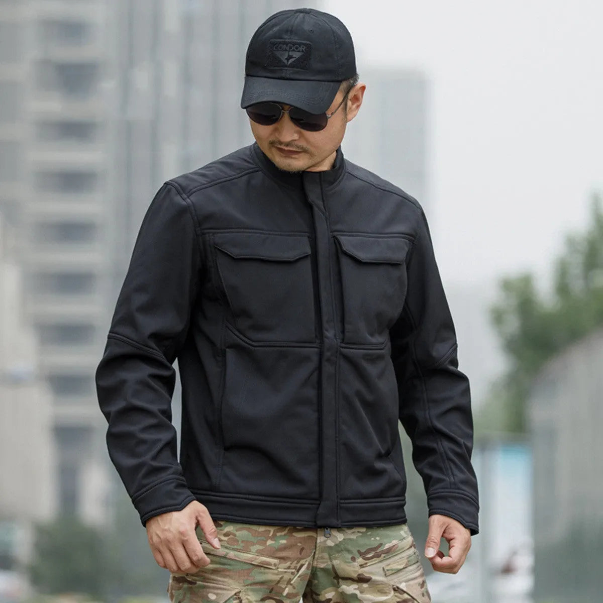 Bone Frog Peak Breaker soft shell jacket in black on a mannequin, showing cardigan style.
