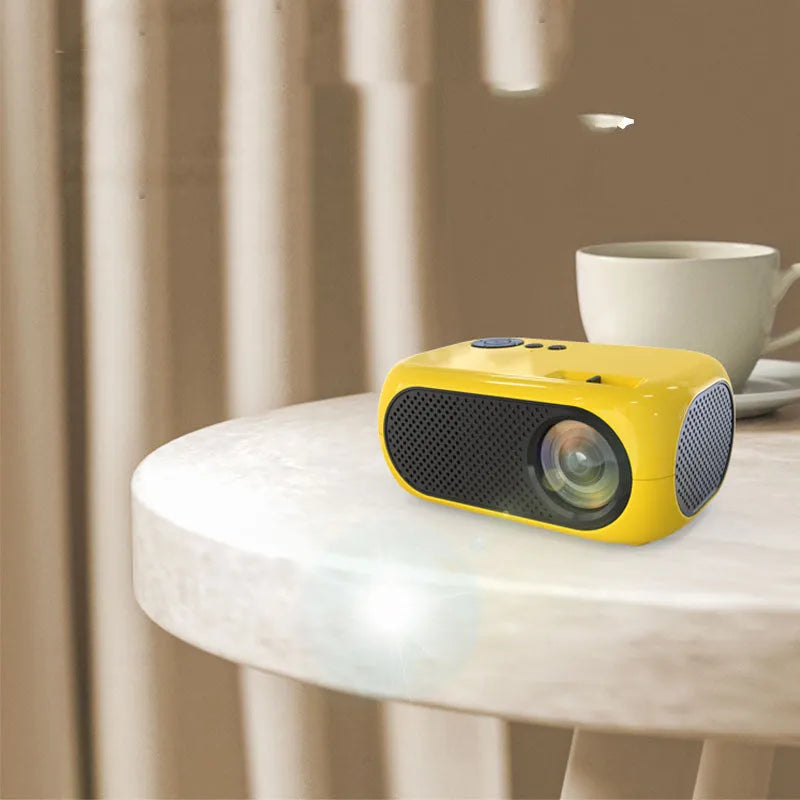 M24 micro mini portable projector in gold or white colour with compact ABS construction