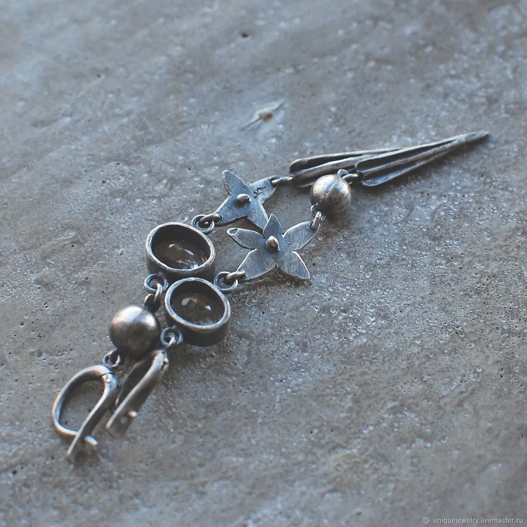 Geometric antique silver rhinestone pendant earrings with XINGX design on alloy base