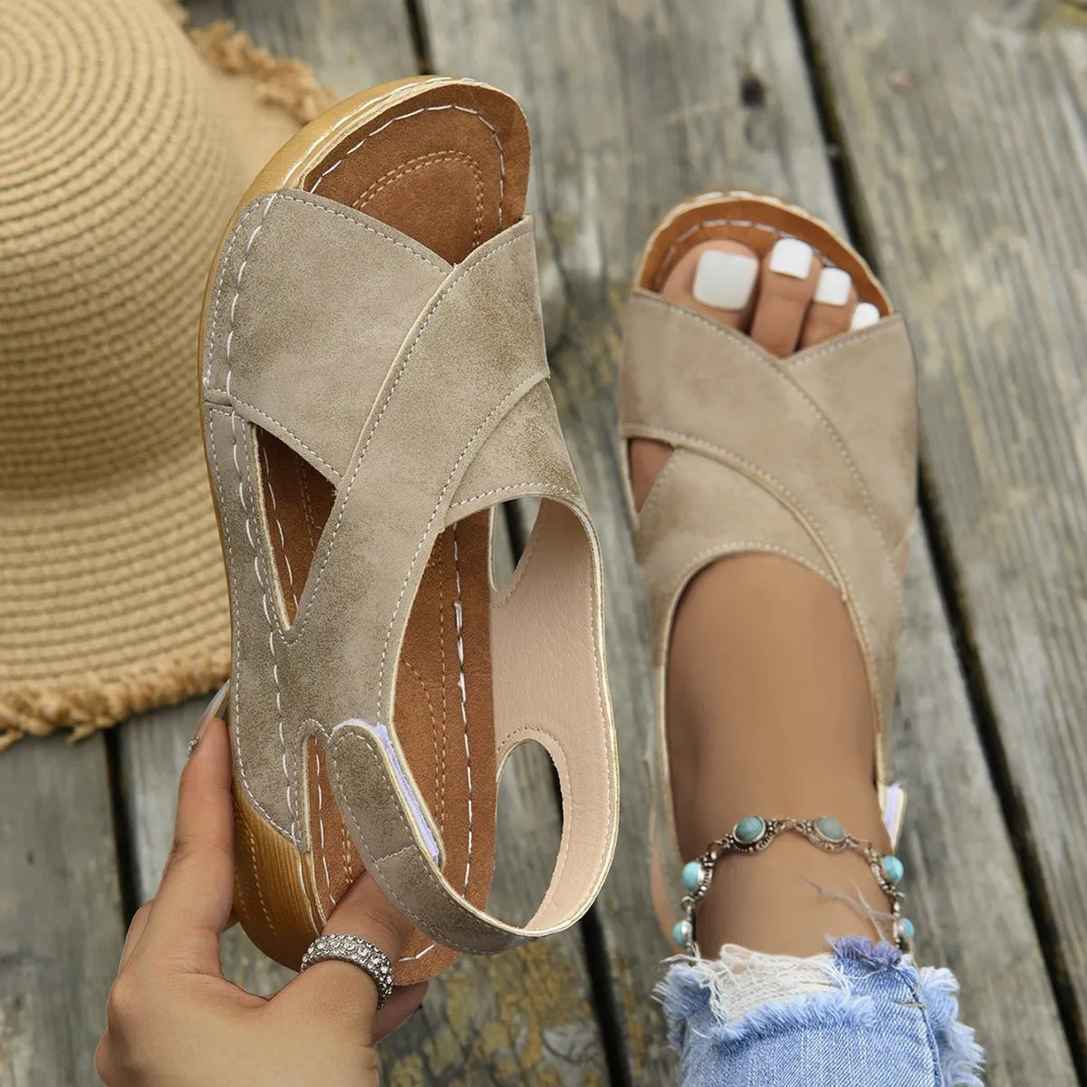 Women's Roman platform sandals with skirt detail, open toe, and adjustable velcro strap.