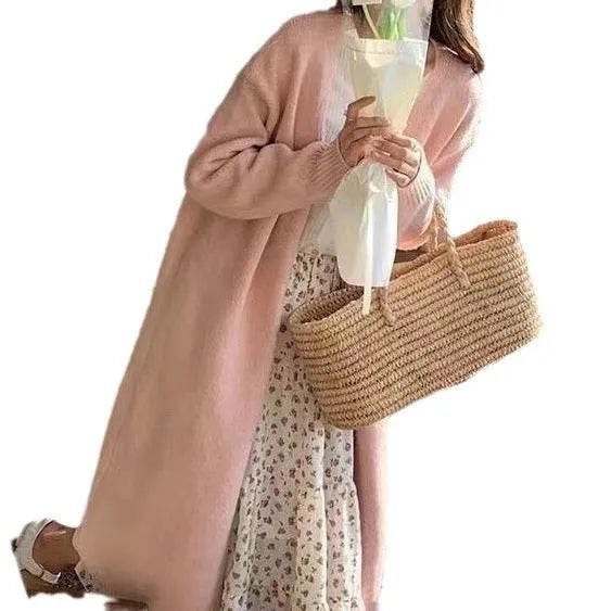 Women's loose fit knitted cardigan in khaki, showing V-neck and long sleeves.