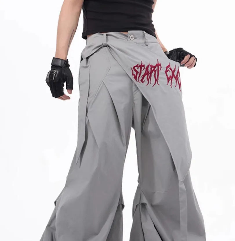 Boy modelling black wide-leg summer pants in a refined Korean style