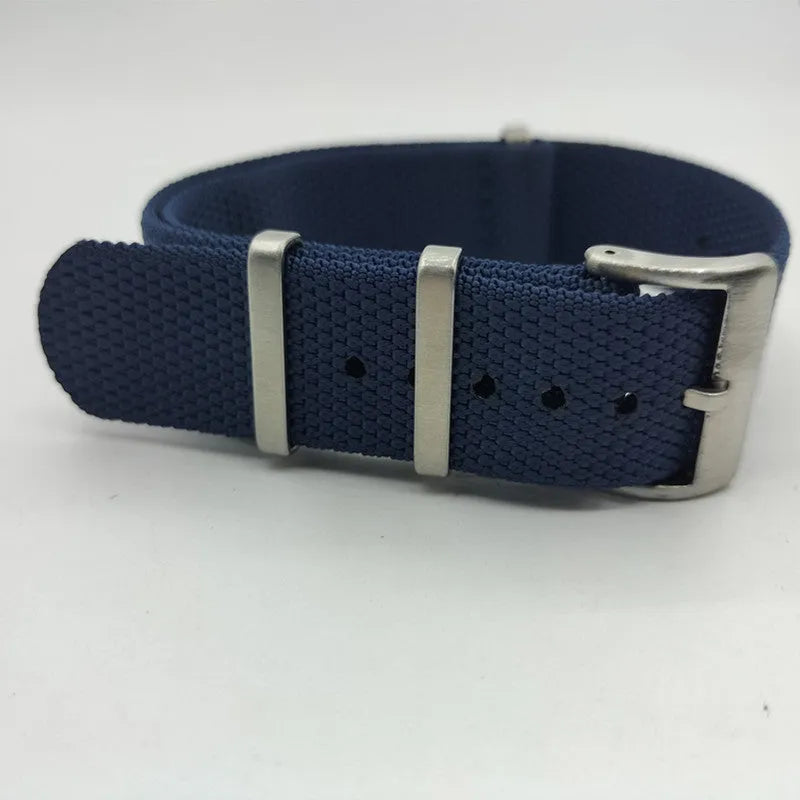 Nylon integrated watch strap in army green colour showing textile texture and buckle.