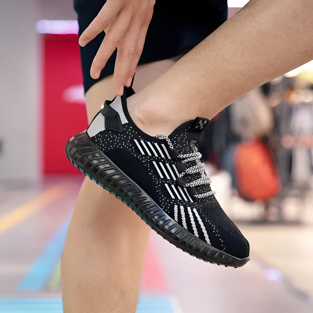 Men's breathable flying fabric sports shoes in white colour showing mesh lining and platform heel design