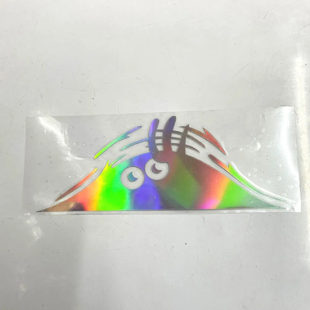 Large self-adhesive body sticker showing a colourful smiley face design, measuring 19cm by 7cm.