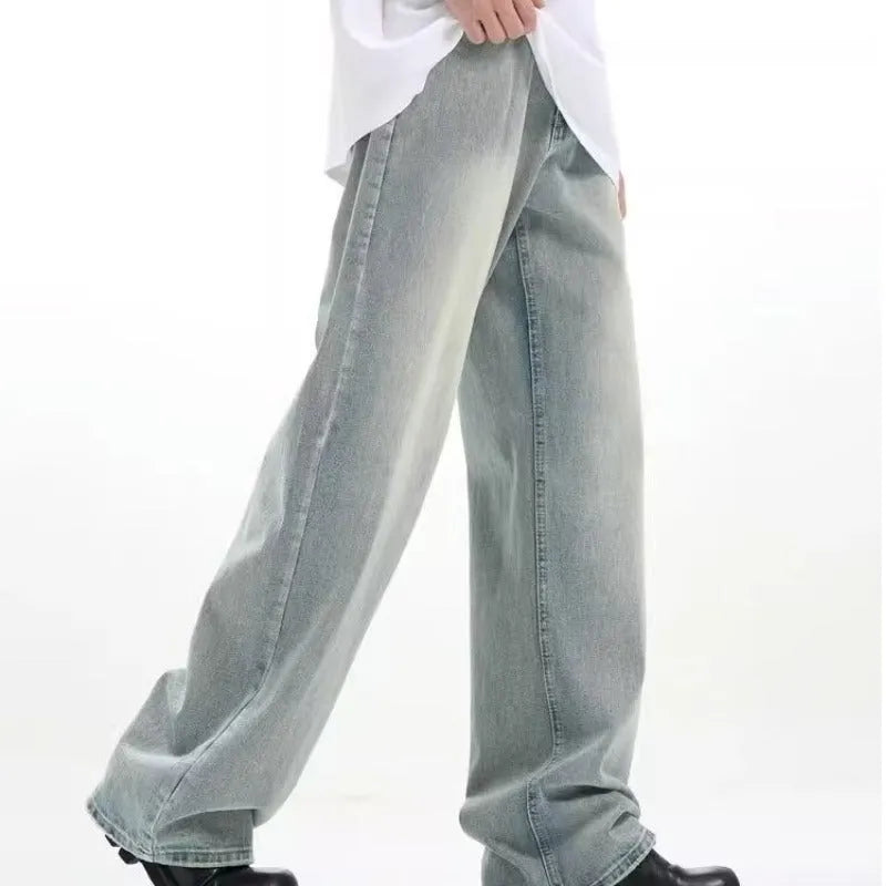 Blue loose-fit retro trousers made from rabbit fur fabric on a hanger.