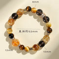 Natural yellow artificial crystal tower bead bracelet with 10mm beads on wrist