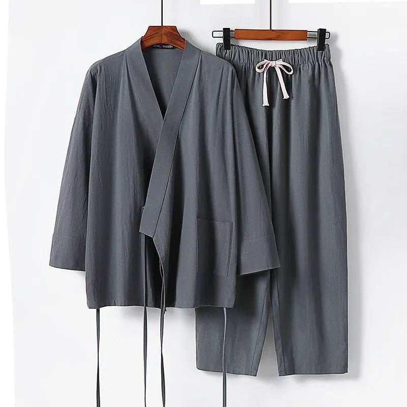 Cardigan-style Hanfu two-piece suit in cotton and linen, shown in apricot colour with shirt-style jacket and trousers.