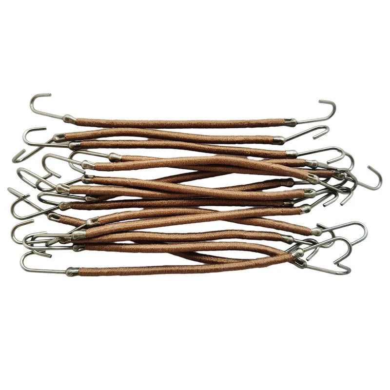 Close-up of a black double hook hair tool for fastening wigs and hair weaves.