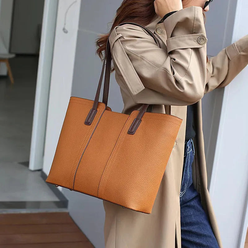 Women's genuine leather commuter bag with internal organisation compartments in horizontal square design
