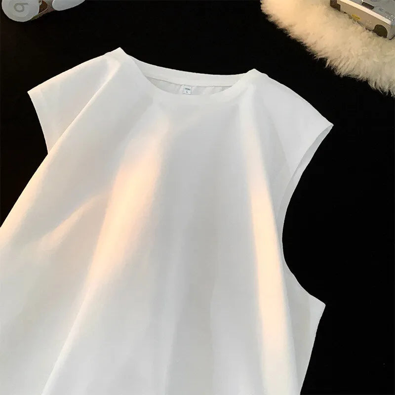 Men's loose solid colour cotton tank top on a hanger, showing straight hem and sleeveless design.