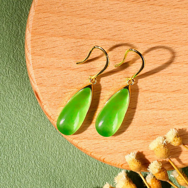 Chinese style geometric earrings with jade colour finish and water droplet design elements