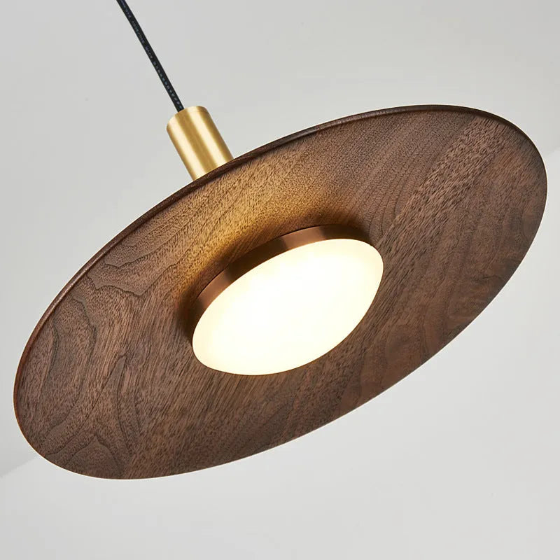 Walnut wood and copper bar chandelier in fish line shape, new Chinese style, showing push button switch.