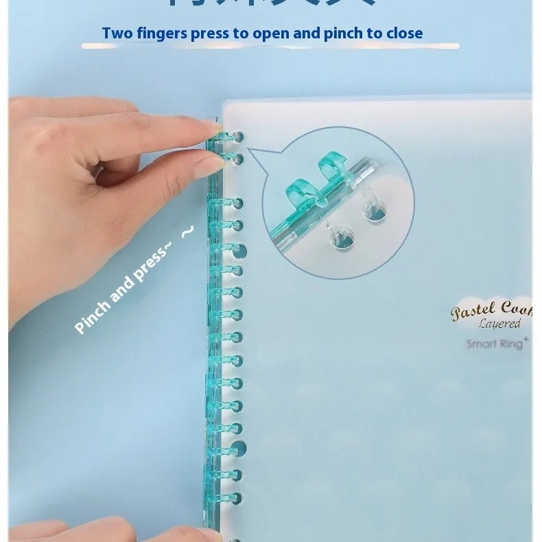 Refillable loose-leaf spiral notebook in B5 size with a pastel blue PP cover and lined pages.