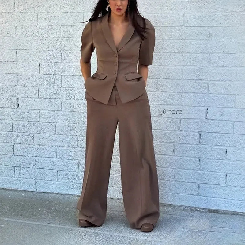 Brown men's slim fit suit with long sleeve top and trousers on a hanger.