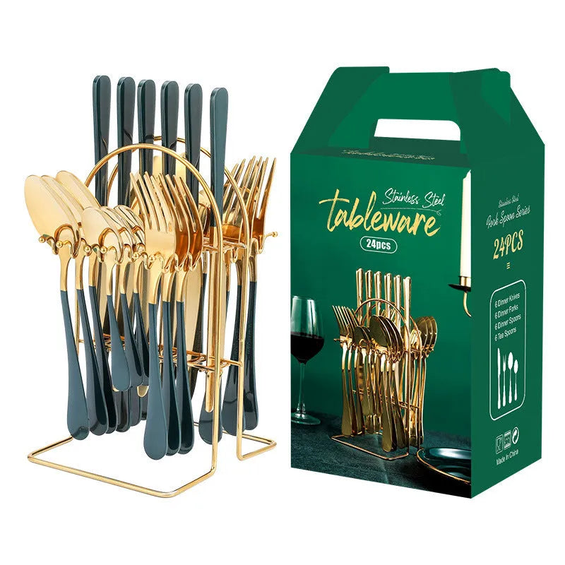 24-piece stainless steel cutlery set with knives, forks, spoons and teaspoons on a storage rack.