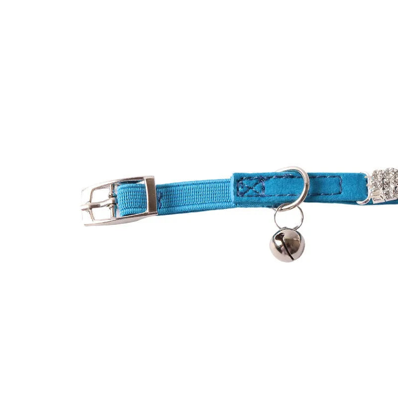 Flocked elastic cat collar with quick-release buckle shown in pink, length 28cm.